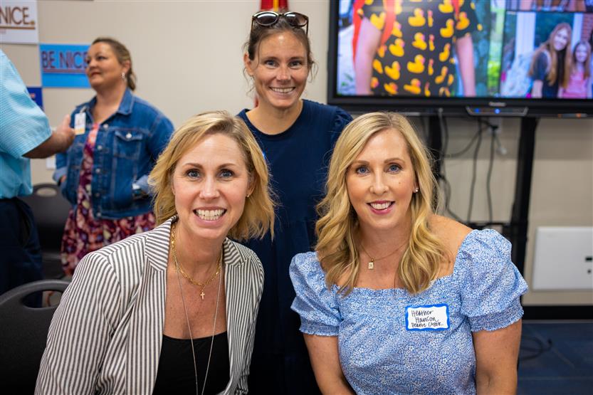 A PTO leadership members and the Pearre Creek Elementary school principal